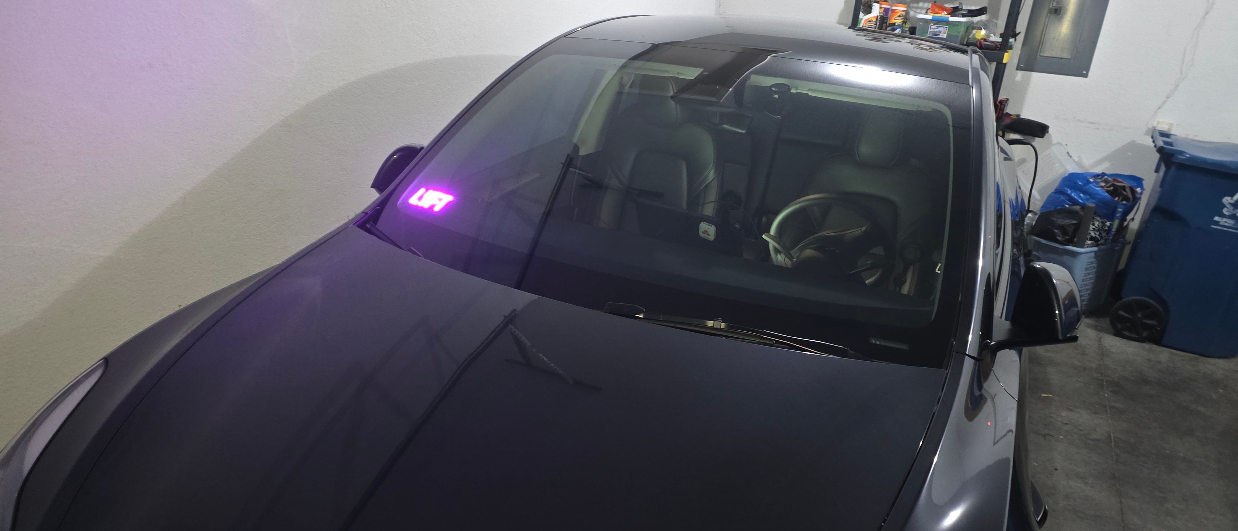 Lyft sticker on the sun visor.